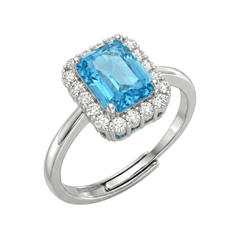 Ring mit rechteckigem blauem Stein und Zirkonen